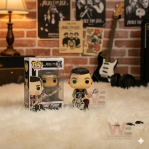 Pierce The Veil Pop Figure Vinyl 8 A Tony Perry vinyl figure with guitar displayed in a music studio themed room.