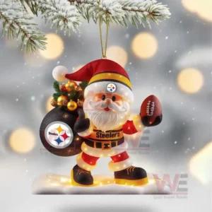 A black and gold Pittsburgh Steelers Christmas gift box decorated with lights footballs and snowflakes on a wooden table!