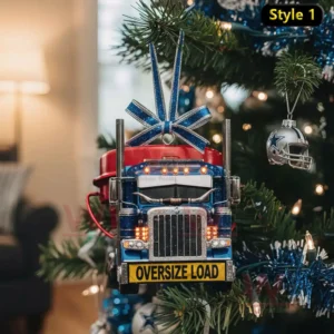 A blue and red truck ornament with lights and an Oversize Load sign hanging on a decorated Christmas tree!