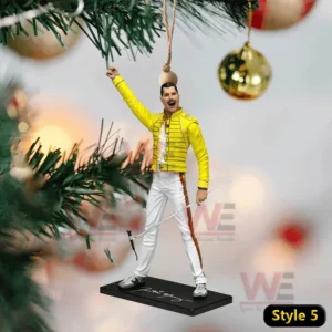 Queen band singer ornament in a yellow jacket hanging on a decorated Christmas tree.
