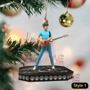 Queen Band Special Ornament 6 Queen band guitarist ornament in a blue outfit playing guitar hanging on a Christmas tree.