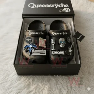 Black Queensryche clogs decorated with themed charms are displayed inside a custom black box lined with tissue paper.
