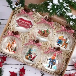 Gift box of Rudolph themed Christmas ornaments with red ribbons and festive packaging!