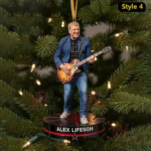Rush Band Christmas Ornament 7 Alt text: Alex Lifeson playing guitar on a Christmas ornament, wearing a blue jacket and jeans, with a Christmas tree in the background.
