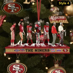 A Christmas ornament featuring San Francisco 49ers legends from various eras displayed on a long decorated stand with holiday ornaments in the background!