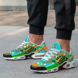 A close-up of a person wearing Scooby-Doo Christmas-themed sneakers with Scooby-Doo graphics, candy canes, and snowflakes.