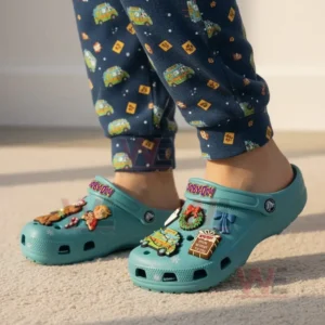 Scooby Doo Mystey Machine Crocs Clogs with Charms 8 Blue Scooby Doo clogs with Christmas-themed decorations sit inside festive packaging with a themed box behind.