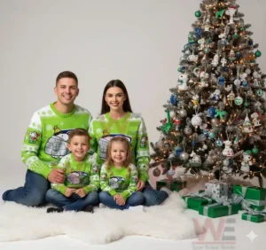 Family wearing matching Seattle Seahawks-themed sweaters with Snoopy by a Christmas tree.
