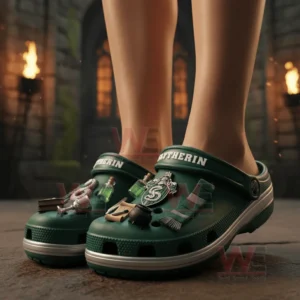 Slytherin Premium Crocs Crocband Clogs With Charms 4 Green clogs with themed charms worn in a torchlit stone hall.