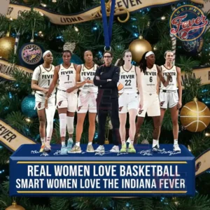Several basketball players and a coach stand on a long ornament hanging from a Christmas tree decorated with gold blue and themed baubles!