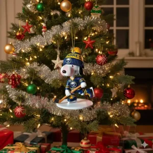 Snoopy Ice Hockey Christmas Ornament 12 A cartoon dog hockey ornament in blue and yellow hanging on a festive Christmas tree!