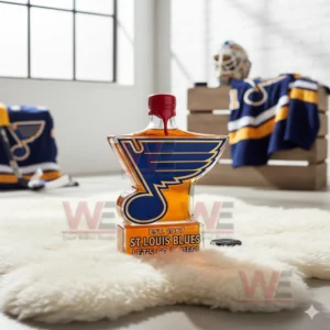 A red capped St Louis Blues logo bottle sits on a white rug in a bright hockey room!