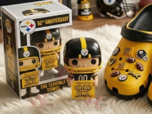 Football themed toy figure holding a small anniversary towel beside its display box and yellow shoes.