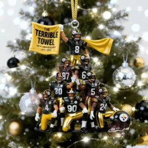 A football themed ornament featuring several players and a Terrible Towel hanging on a decorated Christmas tree!