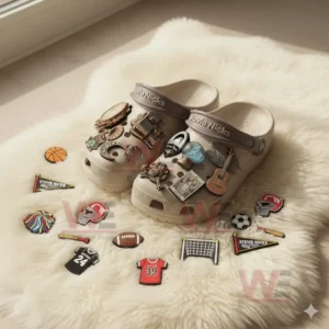 Beige clogs with Stevie Nicks decorations featuring bohemian and musical charms placed on a fluffy white rug.