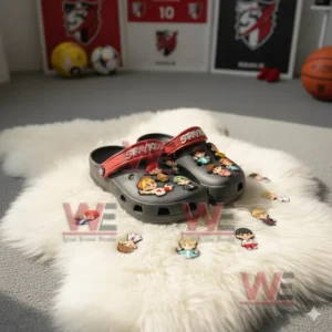 Stray Kids themed Crocs with cartoon charms placed on a white rug in a room decorated with sports items!