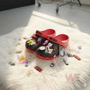 Stray Kids-themed Crocs decorated with animal and music-related charms.