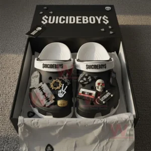 Black and white Suicideboys clogs with themed decorations placed in a black gift box.
