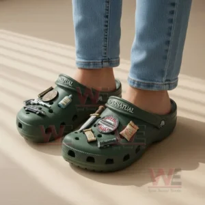 Supernatural Crocs Clogs with Charms 8 Close-up of a person wearing green Supernatural clogs with charms inspired by the show’s symbols and tools.