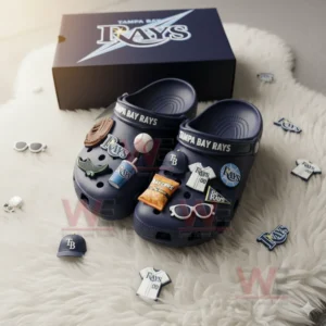 Navy blue Tampa Bay Rays Crocs with baseball themed charms displayed beside team box on white rug!