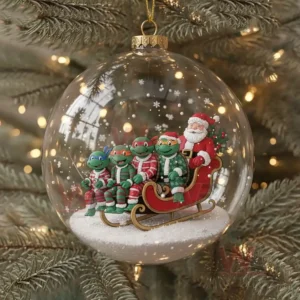 A clear ornament containing the Ninja Turtles riding a sleigh with Santa Claus in a snowy scene!