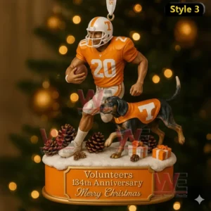 A Tennessee Volunteers Christmas ornament showing a number 20 player and a dog in an orange jersey on a decorated snow base.