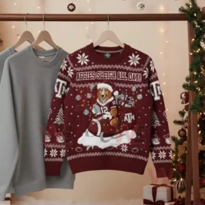 Texas A&M Aggies Christmas sweater hanging on a rack, featuring a dog mascot and 