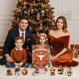 A family sitting together in front of a Christmas tree holding a Texas Longhorns 2025 Advent Calendar surrounded by themed ornaments and decorations!