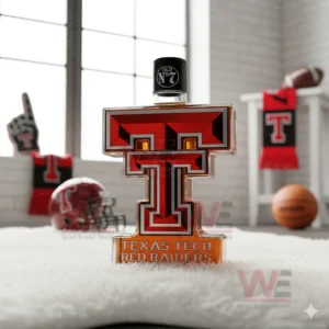 A red and black T shaped bottle sits on a white rug with a helmet a foam hand and a scarf behind it!