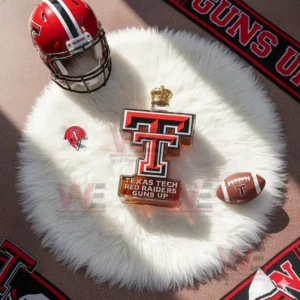 Texas Tech Red Raiders Guns Up Whiskey Bottle 8 A T shaped bottle rests on a white rug with a helmet a football and fan scarves placed nearby!