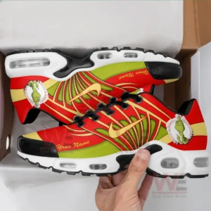 The Grinch Christmas Air Max Plus TN Shoes 9 Alt text: Top view of Grinch-themed Air Max Plus TN sneakers with red, green, and yellow colors, featuring a Grinch graphic.