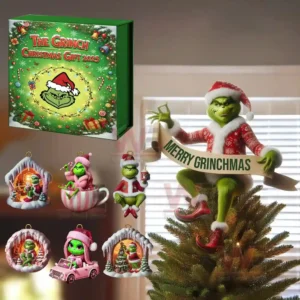 Green holiday gift box with tree topper and several themed ornaments featuring a festive green character.
