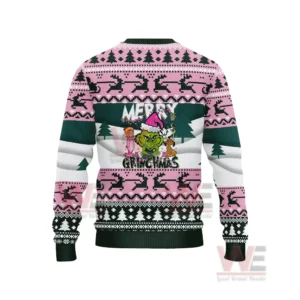 The back of a pink and green Grinch themed Christmas sweater showing holiday graphics!