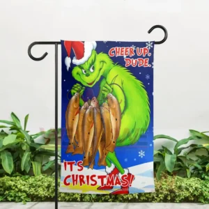 The Grinch Its Christmas Garden Flag 5 Alt text: Grinch-themed garden flag outdoors with the Grinch holding fish and the text