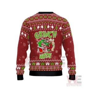 The Grinch Merry Grinchmas Ugly Sweater 5 A red Christmas sweater with a Grinch Mode design shown on a white background!