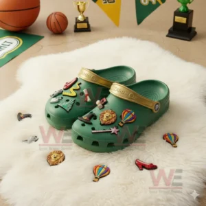 The Wizard of Oz Crocs Clogs with Charms 6 Green The Wizard of Oz Crocs surrounded by scattered themed charms like ruby slippers and Emerald City.