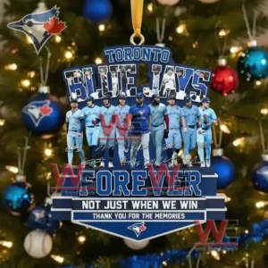 Alt text: Toronto Blue Jays ornament with team players and festive Christmas tree background.