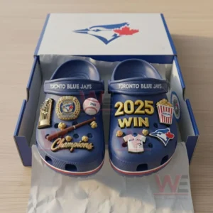 Boxed blue Toronto Blue Jays Crocs with 2025 WIN lettering and baseball themed charms.