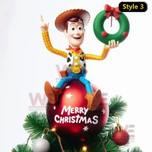 Woody sitting on a red ornament holding a green wreath with a red bow surrounded by Christmas tree branches and decorations.
