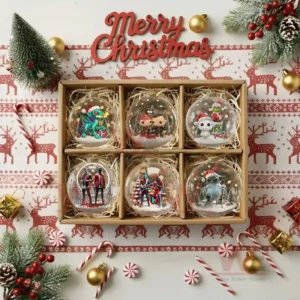 Box of six clear Christmas ornaments each with a different snowy character scene.