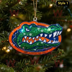 A Florida Gators themed Christmas ornament shaped like the team logo with glitter effects and anniversary text hanging from a golden string.