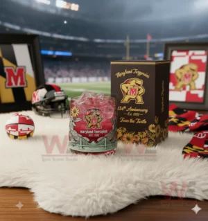 Maryland Terrapins anniversary glass with ice on a white rug in a sports decorated room!