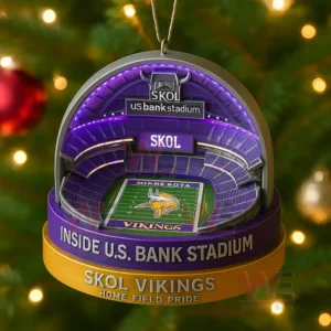 Christmas ornament shaped like U.S. Bank Stadium with Minnesota Vikings theme hanging on a tree.