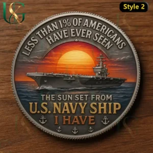 U.S. Navy commemorative coin featuring a ship at sunset with the phrase 