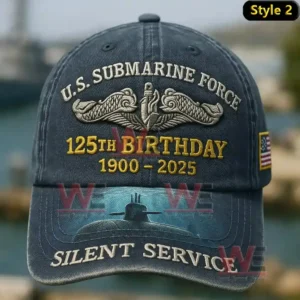 A close view of a navy blue U.S. Submarine Force 125th Birthday hat featuring embroidered text and a submarine illustration on the brim.