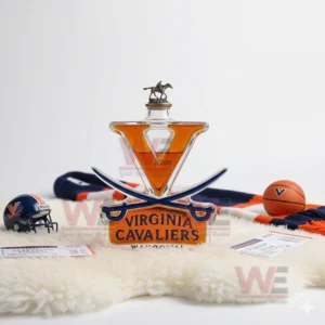 A V shaped Cavaliers bottle sits on a white rug with a helmet a basketball and fan items nearby!