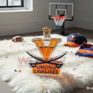 Virginia Cavaliers Limited Edition WAHOOWA Whiskey Bottle 10 A V shaped Cavaliers bottle sits on a white rug with confetti a football a basketball and fan hats nearby!