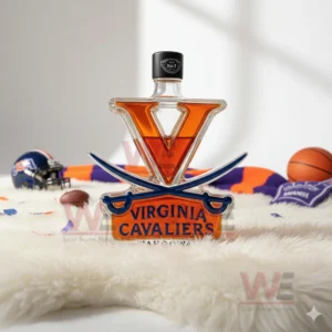 Virginia Cavaliers Limited Edition WAHOOWA Whiskey Bottle 11 A V shaped Cavaliers bottle sits on a white rug with a helmet a football a basketball and scarves around it!
