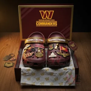 Boxed maroon Washington Commanders Crocs with golden team-themed decorations.