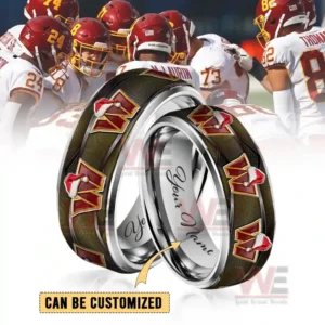 Two silver rings with dark olive festive emblem bands and customizable inner engraving!